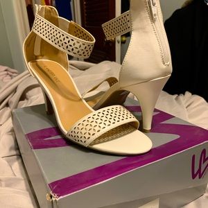 Womens Preparated ankle strap heel in 11wide.